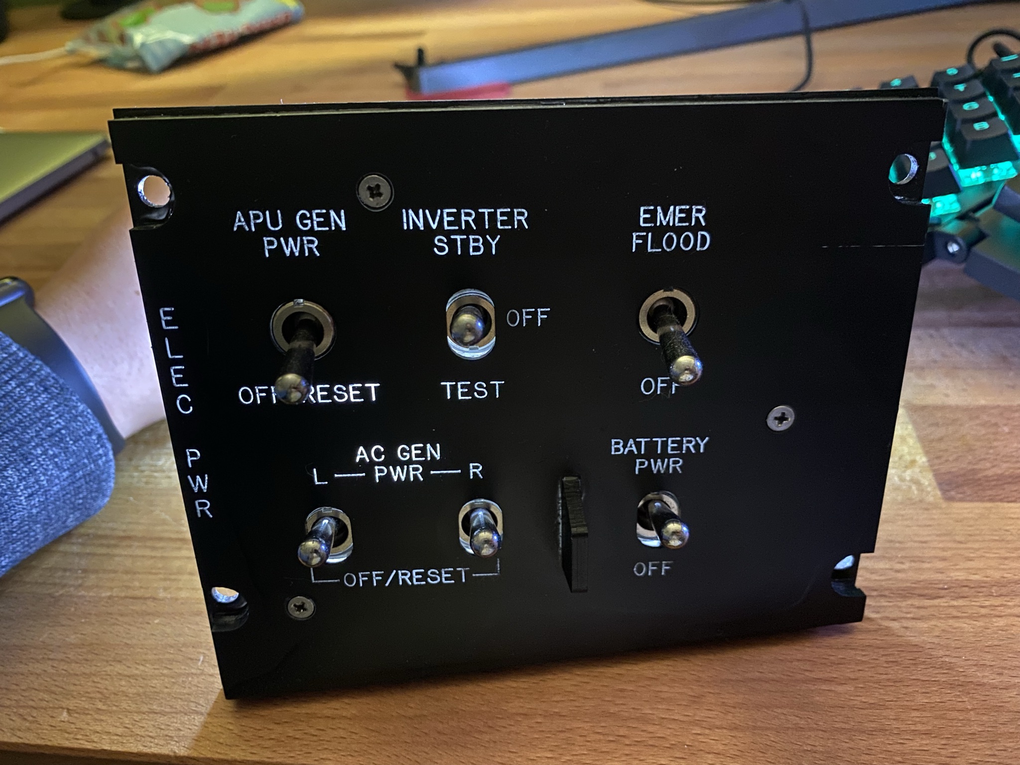 The first proper iteration of my Electrical Power Panel. This was constructed and milled on my CNC machine. It doesn't yet include its green backlight in this picture.